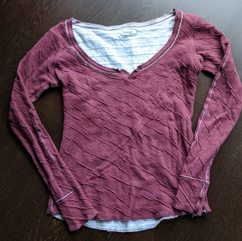 TNA Top